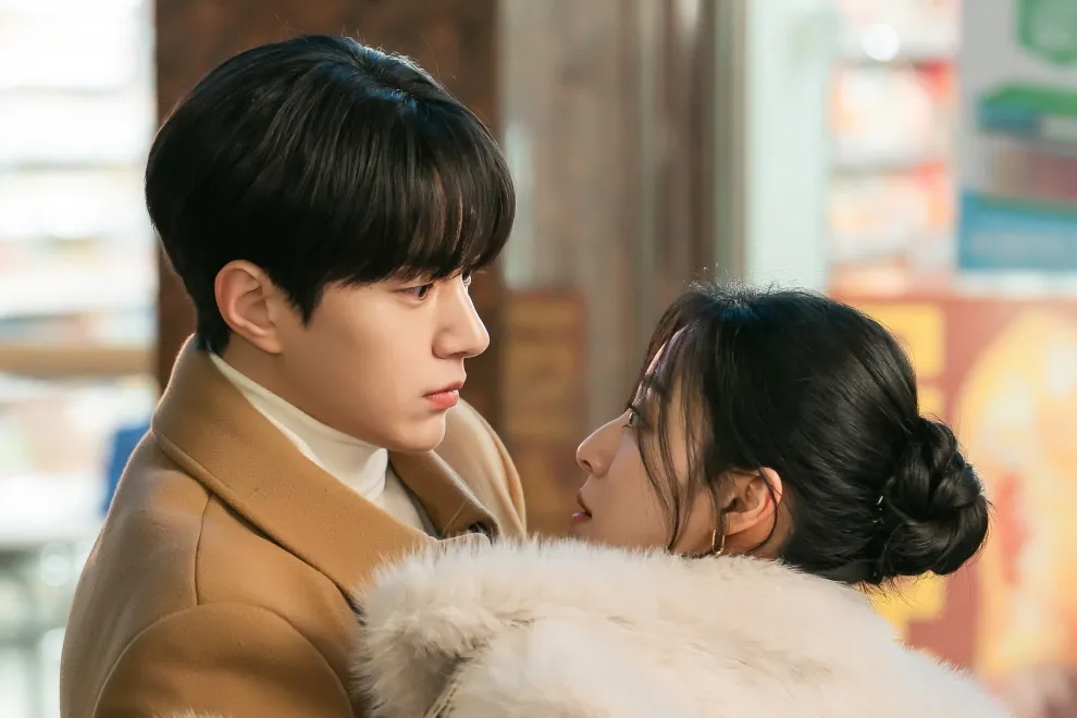 Love in Sync K-drama poster featuring Kim Myung-soo and Kang Min-ah in a pink and purple heart-themed design, premiering July 4, 2026