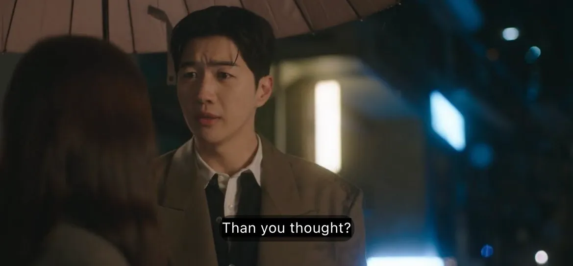 CEO Kang and Da Reum talking while waling in the rain